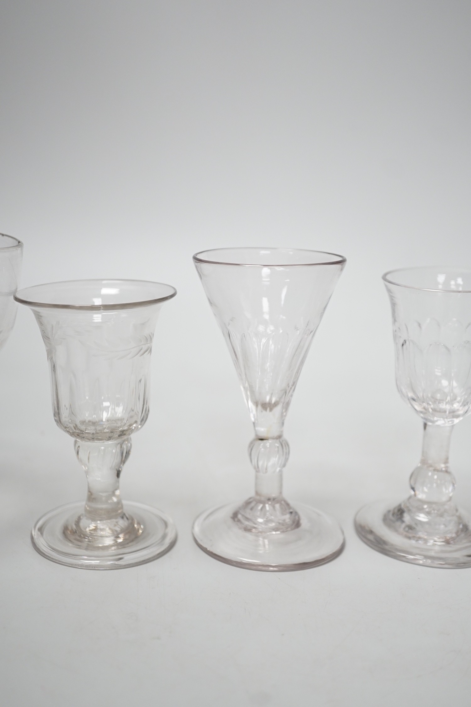 A small Georgian glass rummer and five cordials. Tallest 12cm